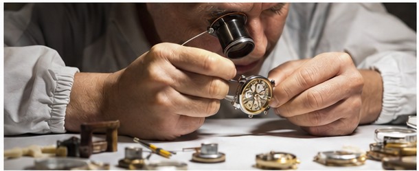 Watchmaker at a workbench